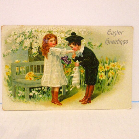 Antq Easter postcard of a young man kissing a little girls's hand - Picture 1 of 6